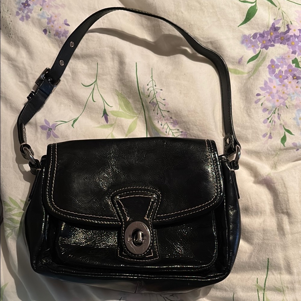 - Coach Black Shoulder Bag with Adjustable Strap and Flap Closure